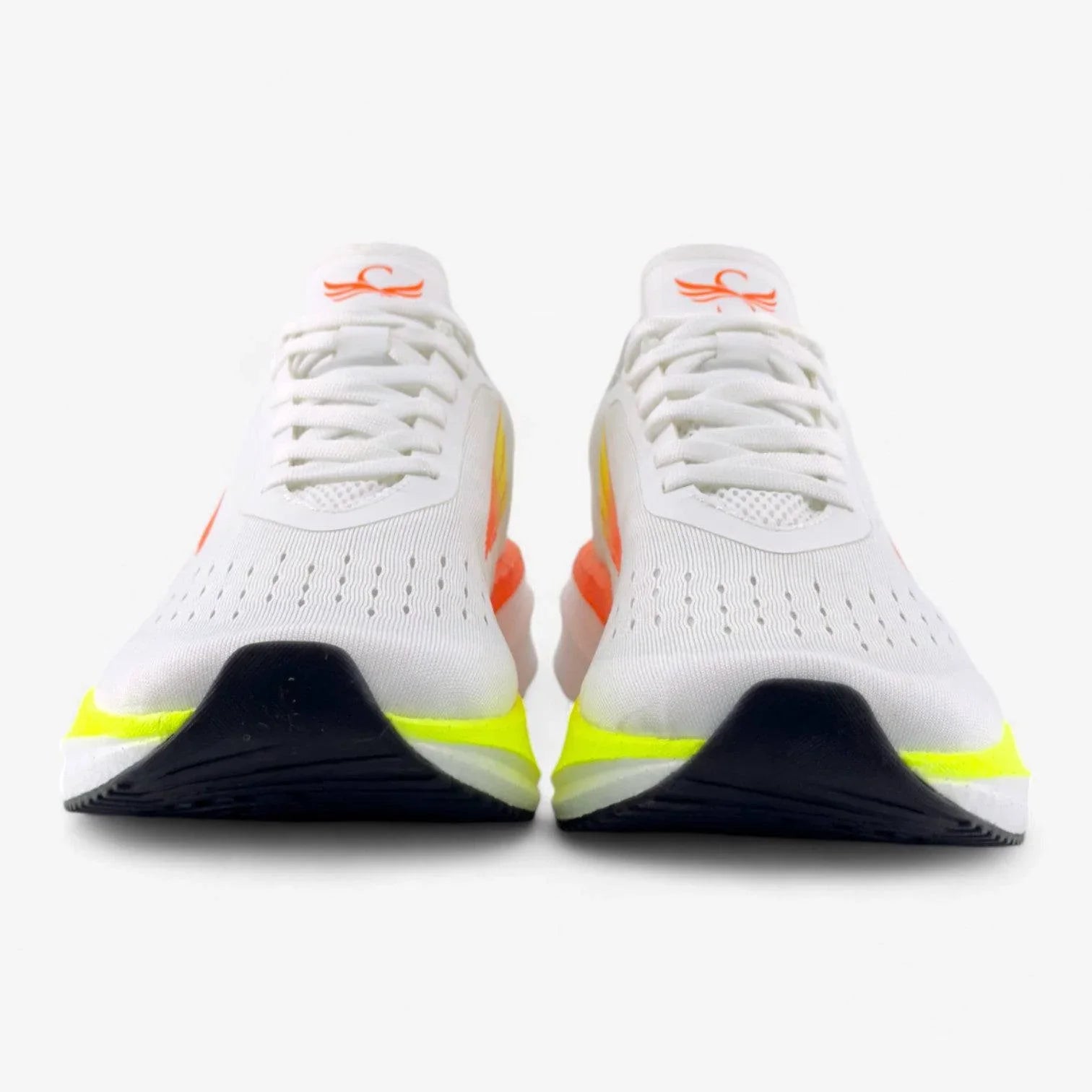 White women's running shoes with yellow and orange accents, front view on white background