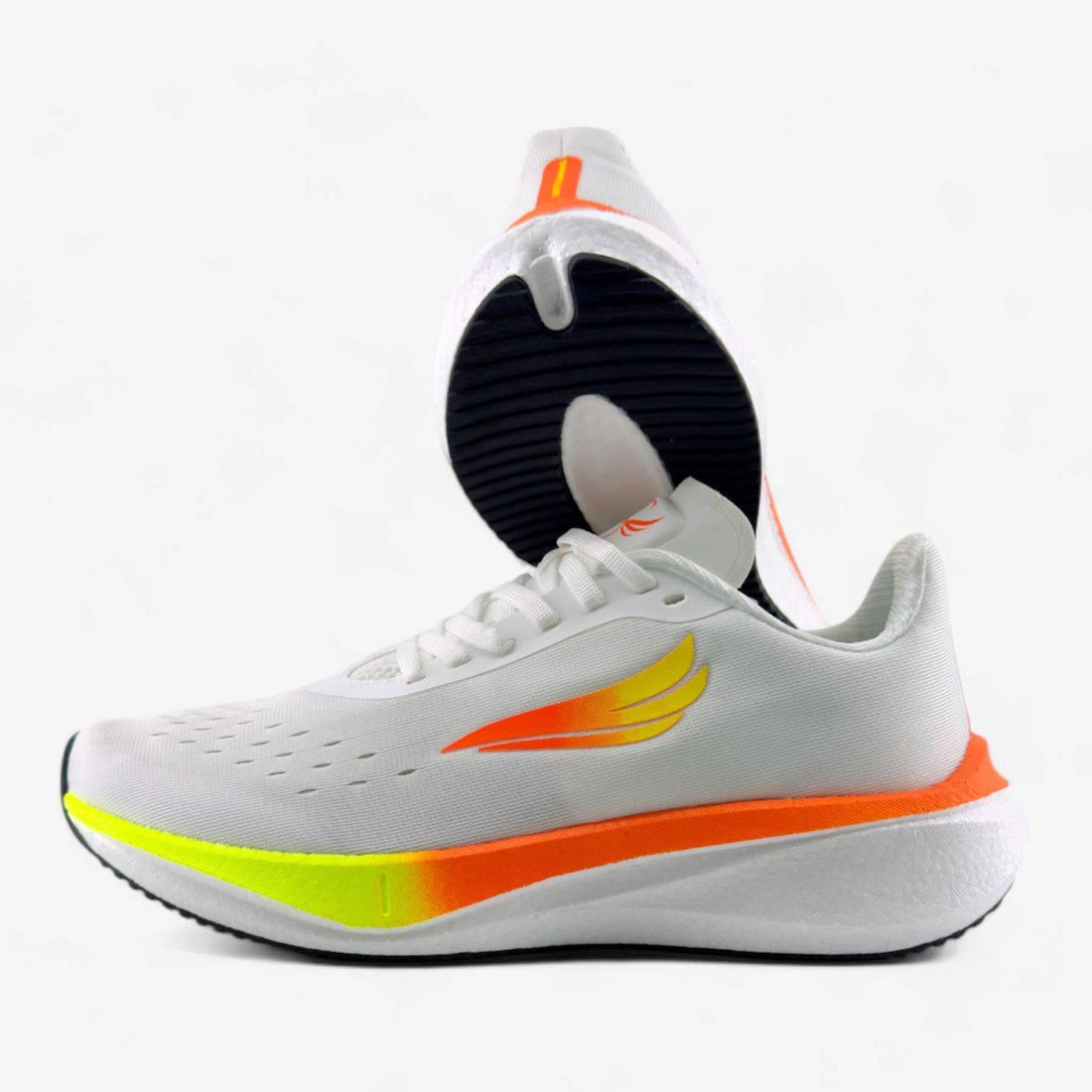 White women's running shoes with yellow and orange accents, lightweight athletic design