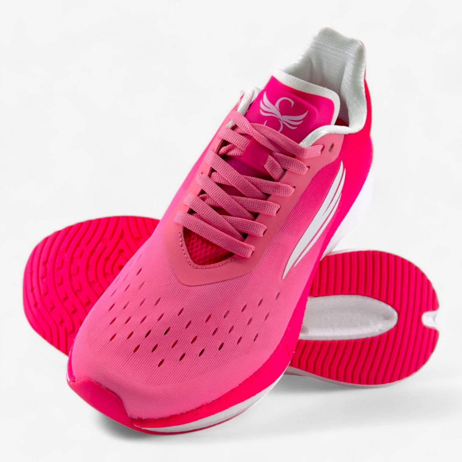 Pink women's running shoe with breathable mesh upper and cushioned sole, athletic footwear