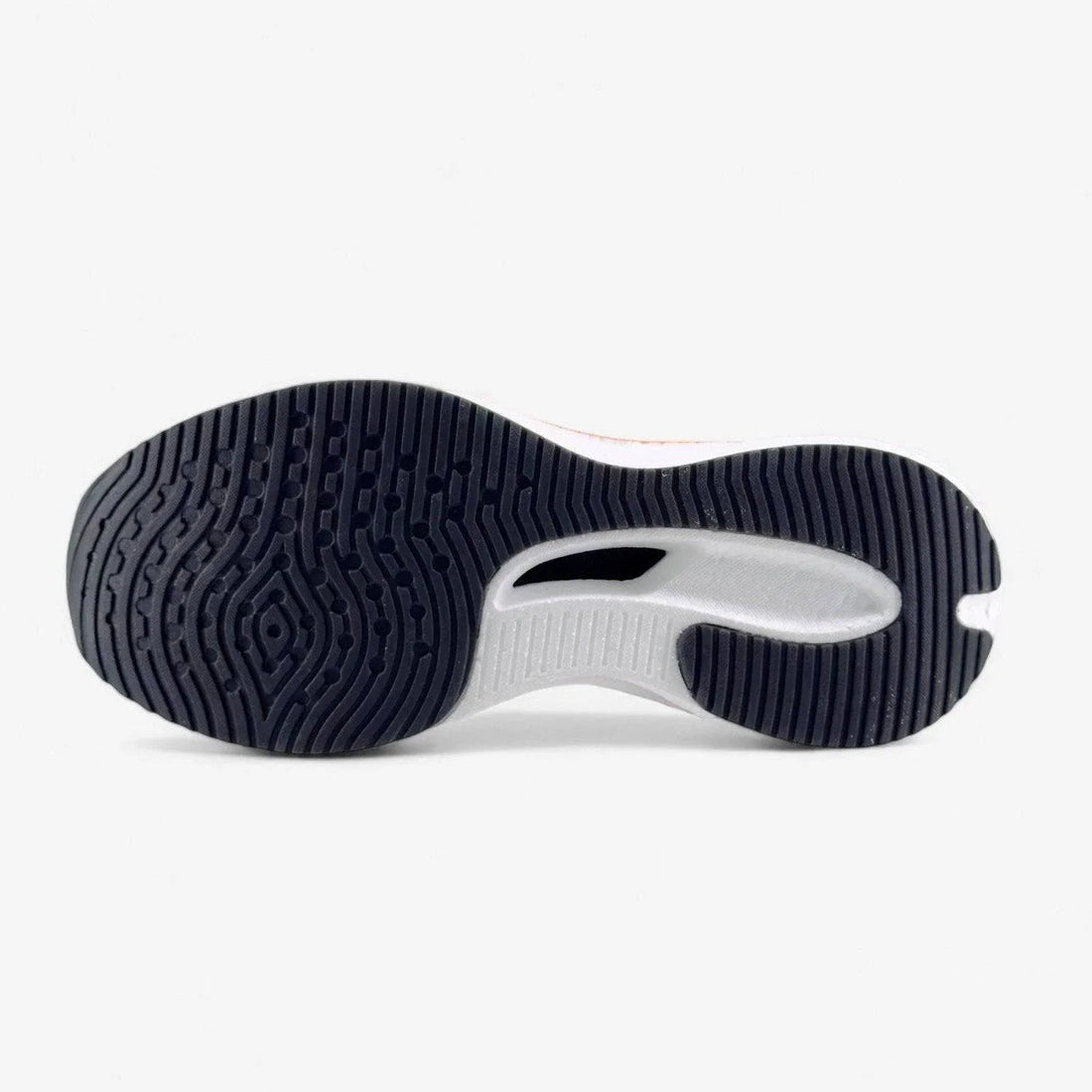 Black and white rubber outsole of a women's running shoe with textured tread pattern