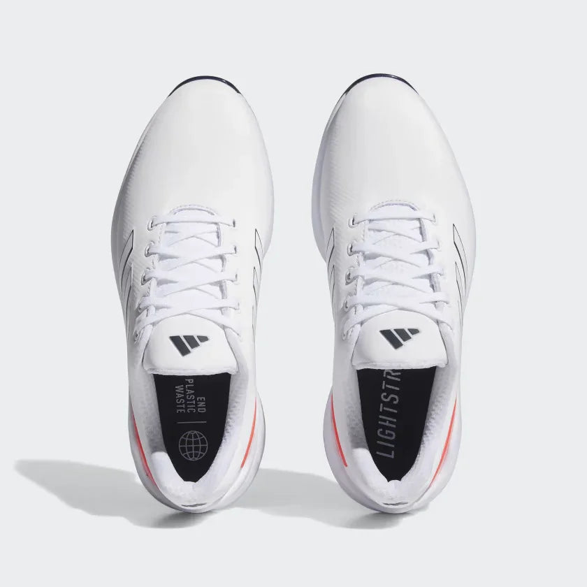 White men's athletic golf shoes with laces, viewed from above, featuring black accents