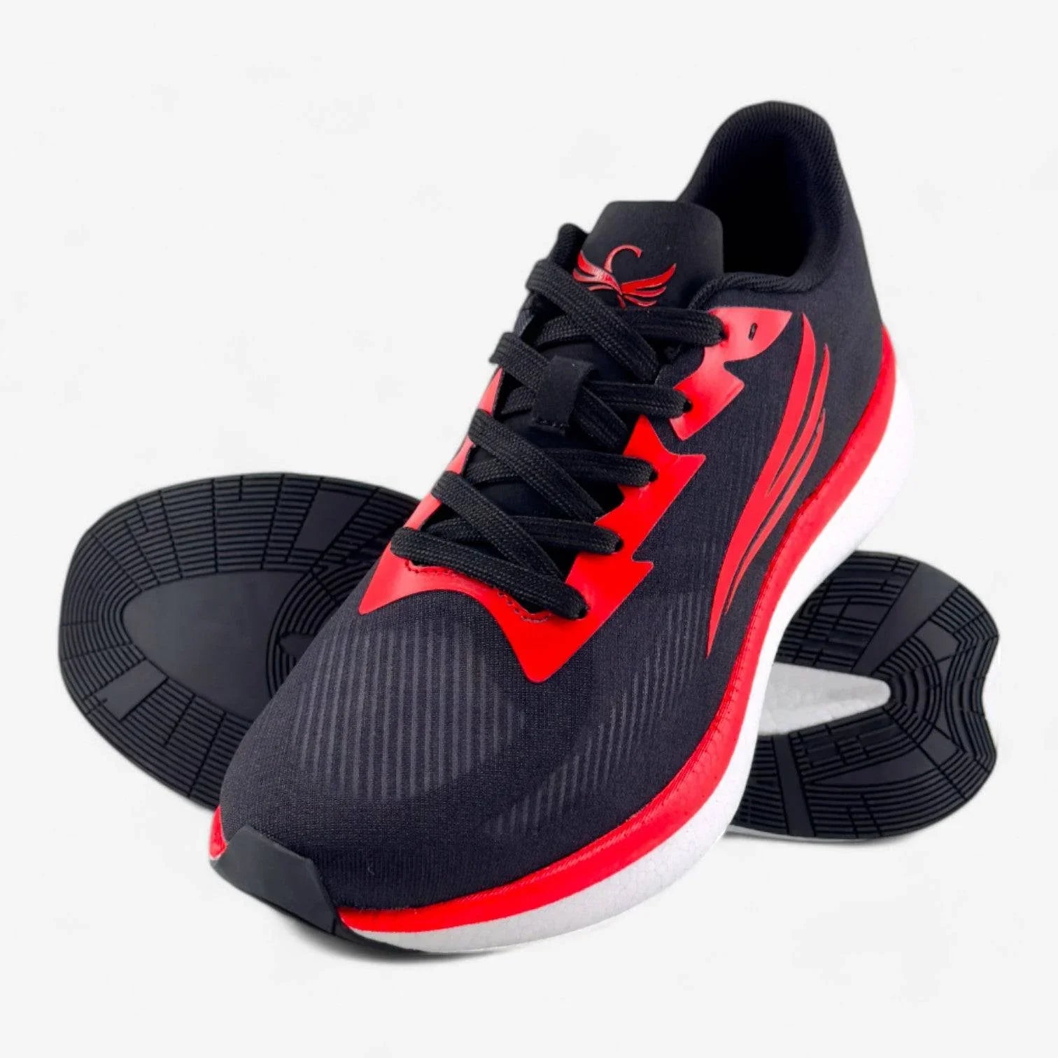Black and red men's running shoe with white sole, lightweight design, and tread detail