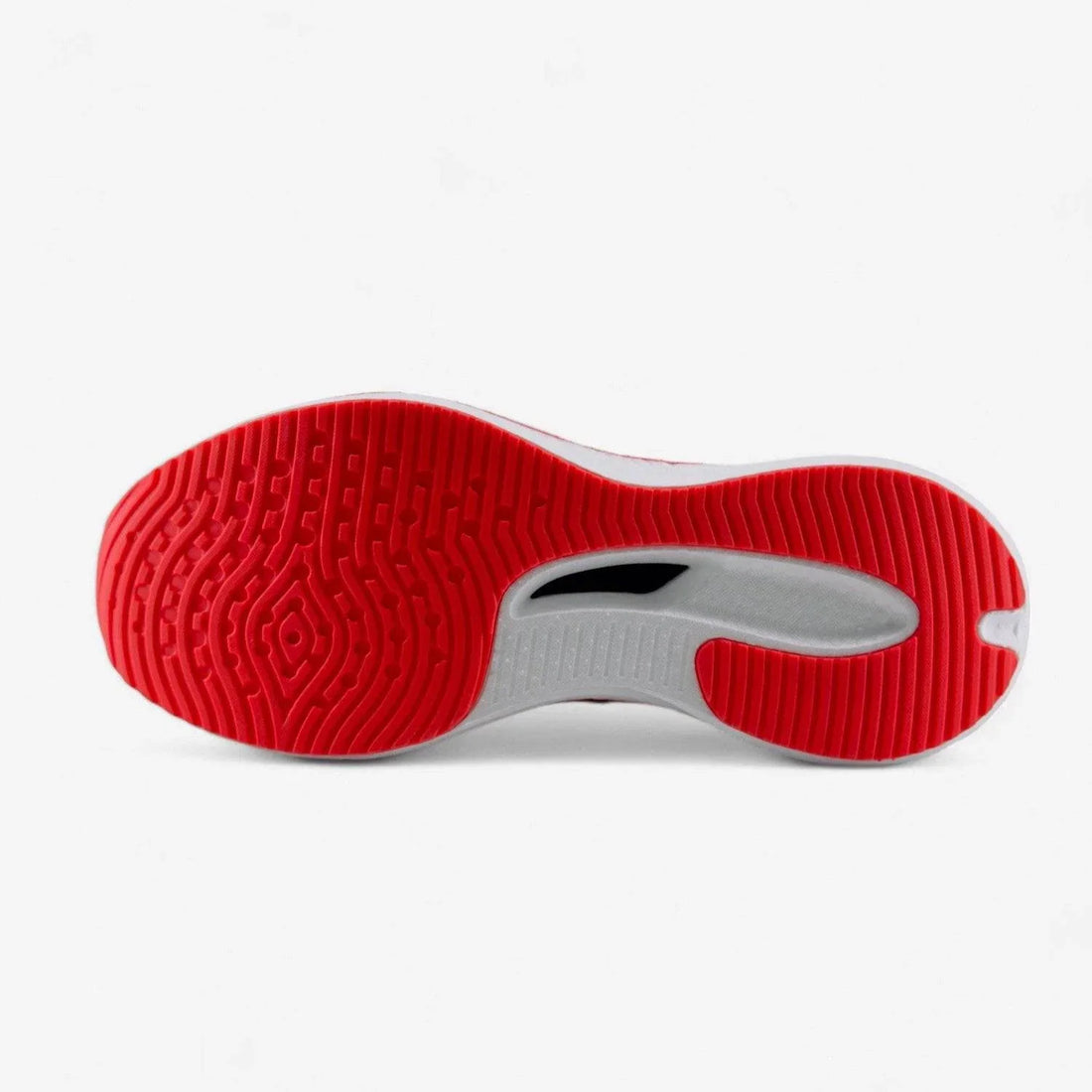 Red and white athletic running shoe sole with textured grip pattern on white background