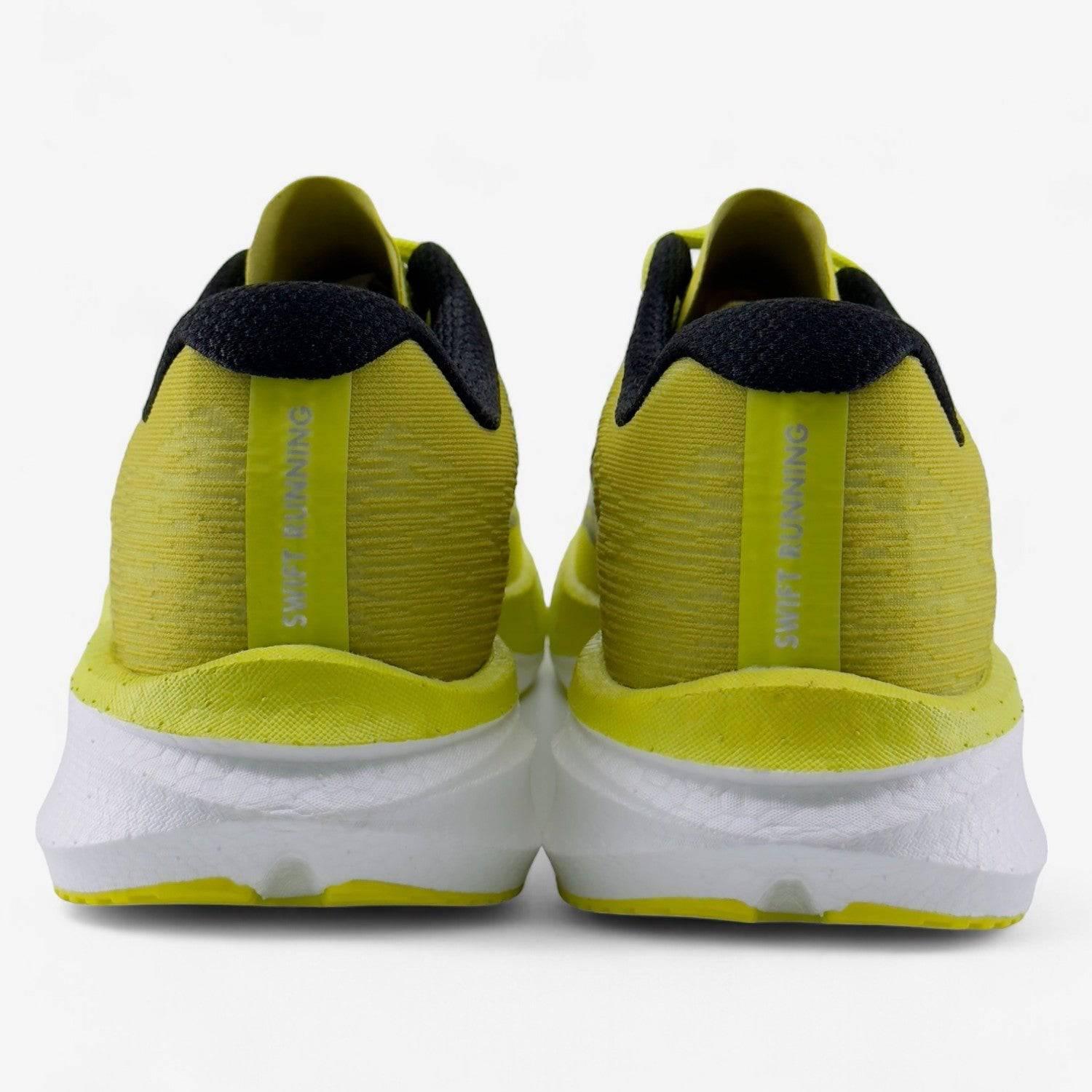 Rear view of yellow men's running shoes with black collars and white soles