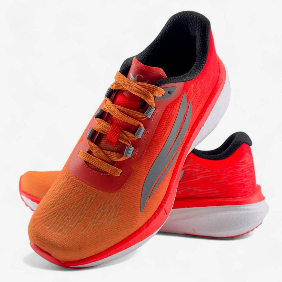 Orange and red men's running shoes with reflective detail, lightweight cushioned sole