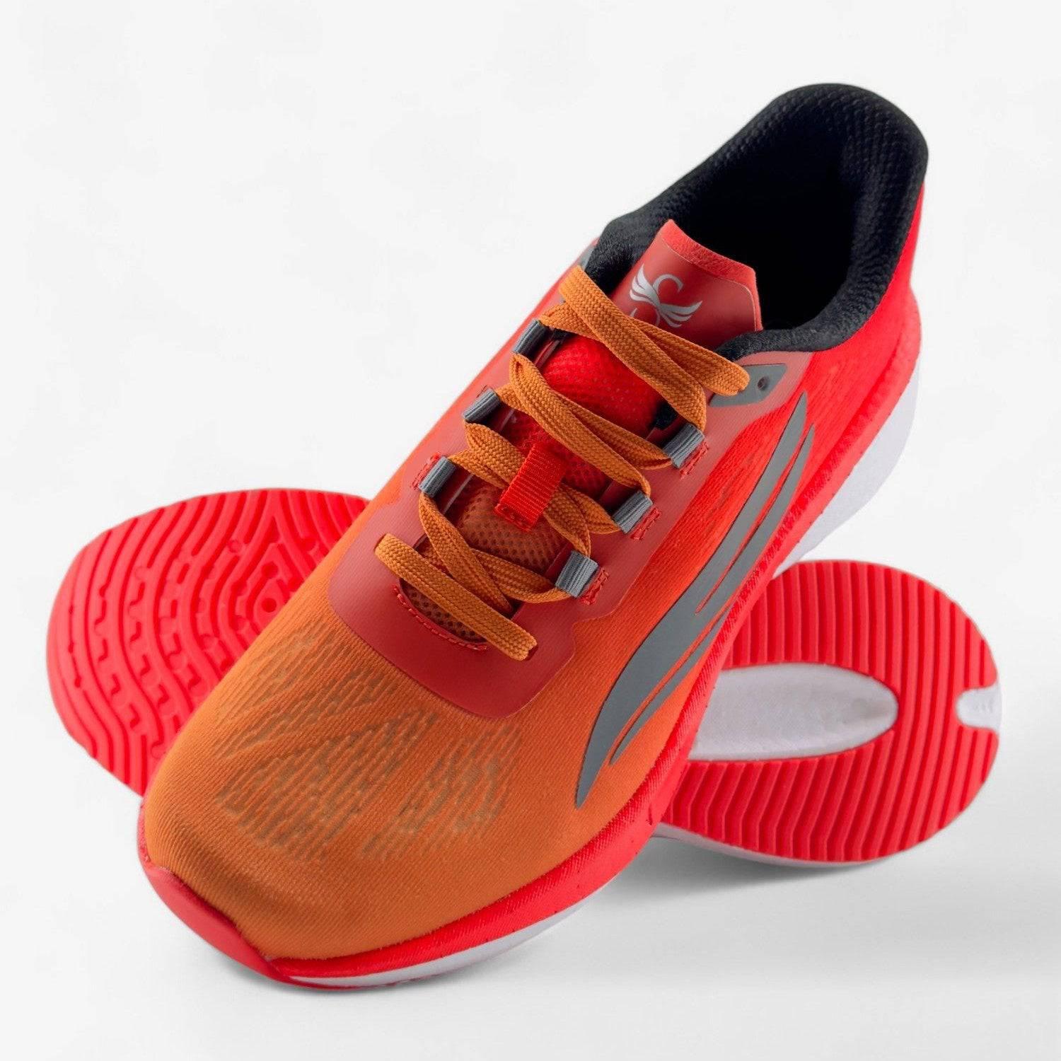 Men's orange and red athletic running shoe with mesh upper and textured sole on white background